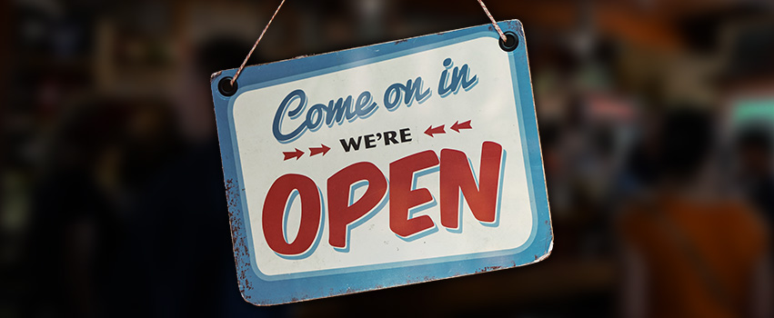 "We're Open" sign