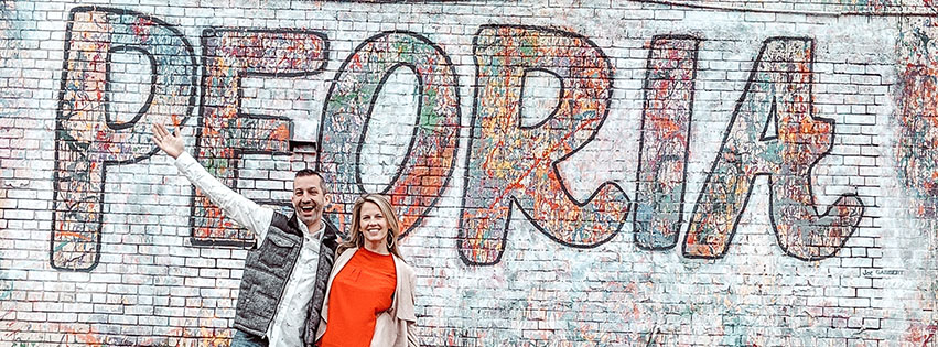 Cliff & Jodie Vieira in front of the Hello Peoria mural