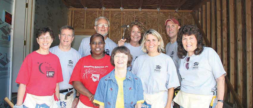 RE/MAX Realtors volunteering for Habitat for Humanity, early 2000s