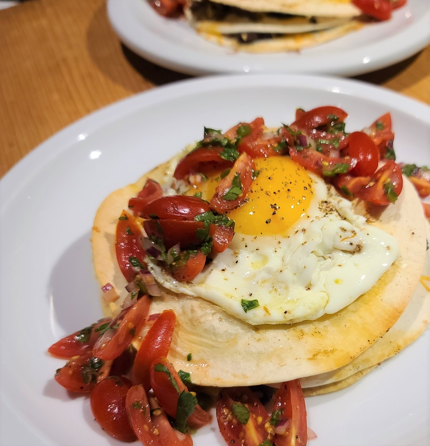 Sausage & black bean stack with eggs and salsa
