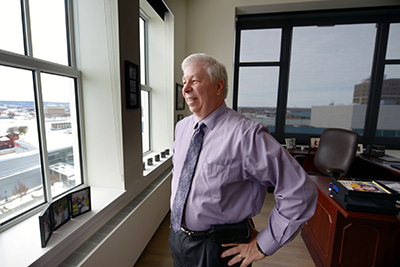 OSF HealthCare CEO Bob Sehring takes in the spectacular view from his office