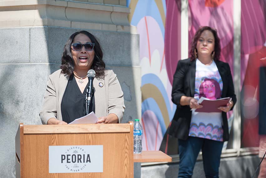 In June 2021, Mayor Ali spoke at the ceremony dedicating the first two installations of the “Portraits of Peoria” series.