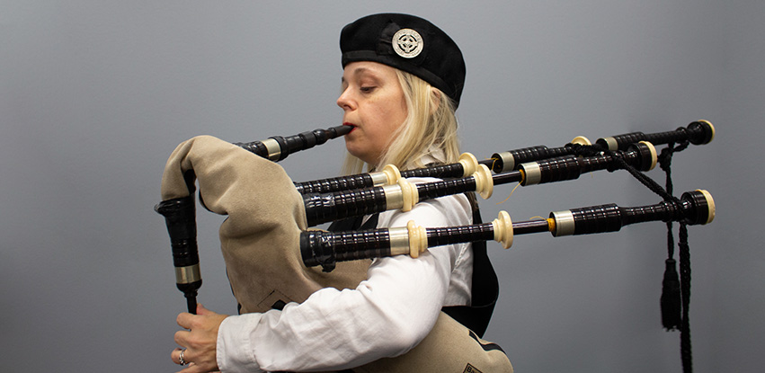 Kari Smith playing the bagpipes