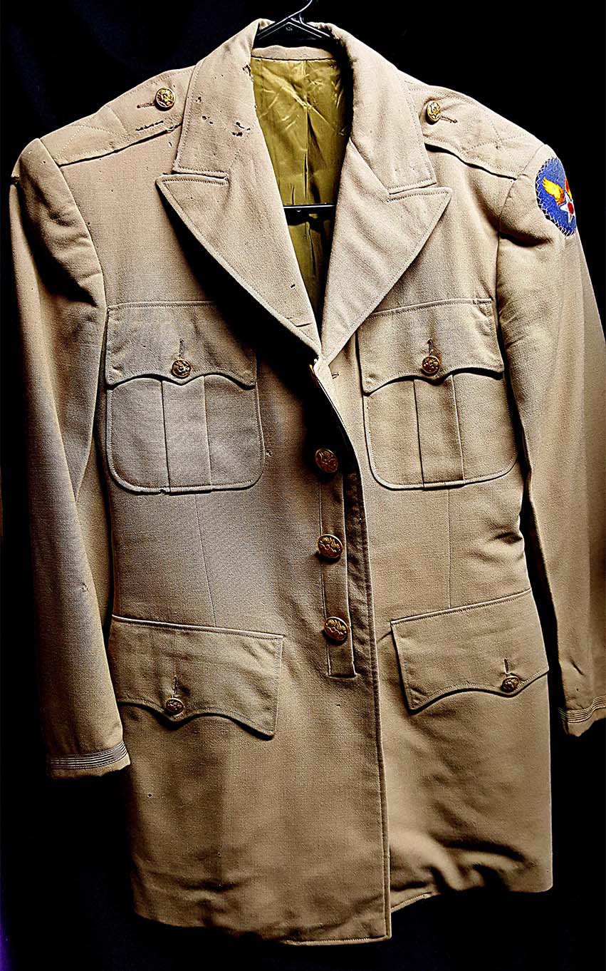 Kennedy's uniform was among the priceless souvenirs recovered  from his Peoria home after his death.
