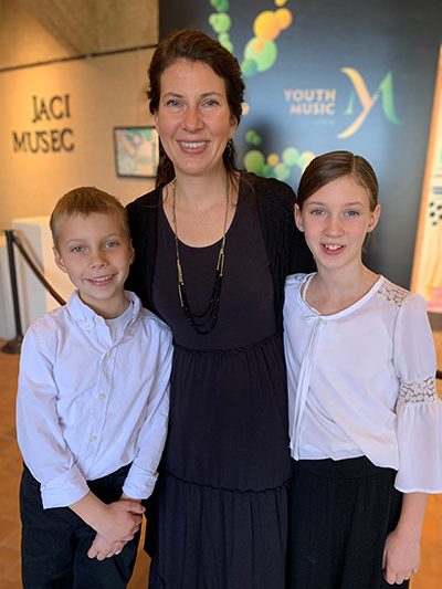 Suzuki School Director Laura Otto with her son Luke and daughter Ava