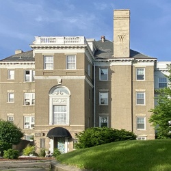 The Greenhut mansion and other whiskey baron homes still stand as a reminder of the wealth that flowed into Peoria during the years of the Whiskey Trust. The “W” on the chimney recalls Mrs. Greenhut’s brother’s family, the Wolfners, who converted the home into apartments circa 1916.