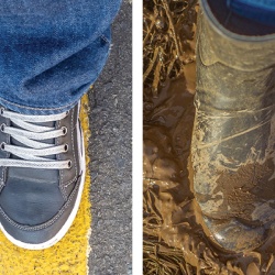 Foot on a street and a foot in the mud