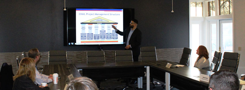 Lonnie Whisker, quality and performance improvement specialist and project portfolio manager at Children’s Home, presents the organization’s project management structure at a recent board meeting.