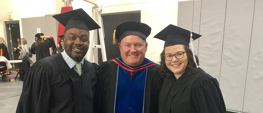 McMillan, center, with Anthony Rush, director of youth services at Children’s Home, and Kirstin Ringel, volunteer coordinator with Habitat for Humanity, graduates of the Master’s in Nonprofit Leadership program at Bradley University.