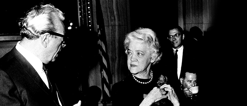 Smith converses with Dirksen while affixing her iconic rose pin to her dress, 1966. Just as Dirksen advocated for the marigold as the national flower, Smith advocated for the rose—which it became in 1986, after Dirksen’s death.