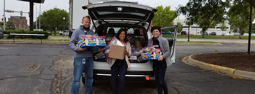 Volunteers with food donations