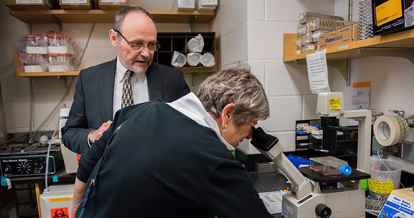 Diane with Dr. Michael J. Birrer, director of the UAMS Winthrop P. Rockefeller Cancer Institute and a leading research partner with The GCS Project.