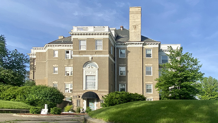 The Greenhut mansion and other whiskey baron homes still stand as a reminder of the wealth that flowed into Peoria during the years of the Whiskey Trust. The “W” on the chimney recalls Mrs. Greenhut’s brother’s family, the Wolfners, who converted the home into apartments circa 1916.