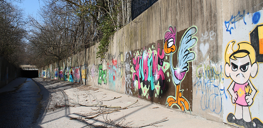 The dream of connecting Peoria’s parks via boulevard gave way to a multilane superhighway and a modern flume drainage system. Today, "the Flumes" are a popular site for local graffiti artists.