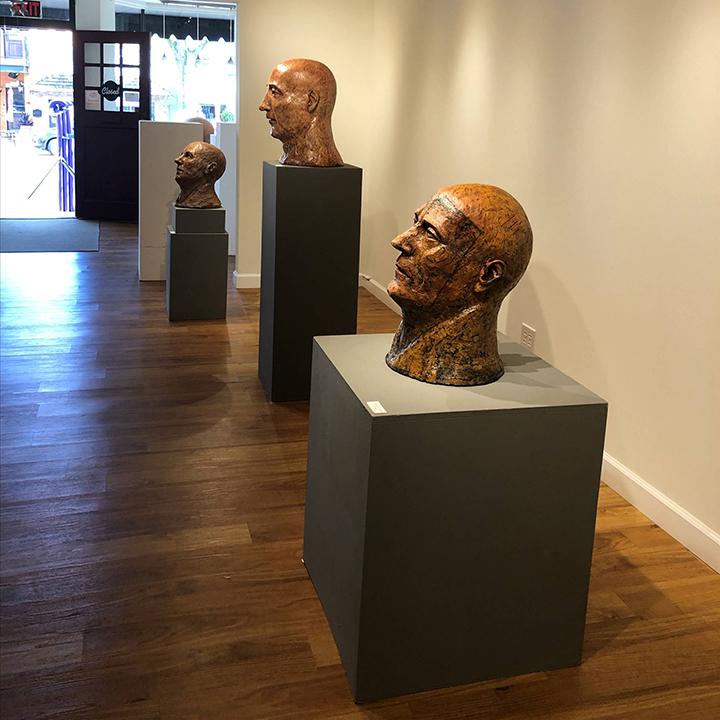 "Reflections" by sculptor Marlene Miller was Exhibit A's featured exhibition in September 2020. The distinctive ceramic heads were created during lockdown as a meditation on complex psychological and emotional states.