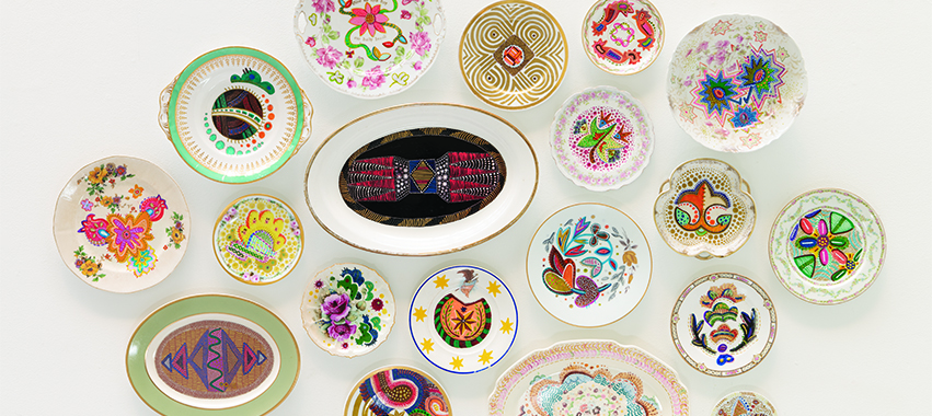 These painted plates are Lee’s homage to the global impact of Native Americans. Photo by Evan Temchin