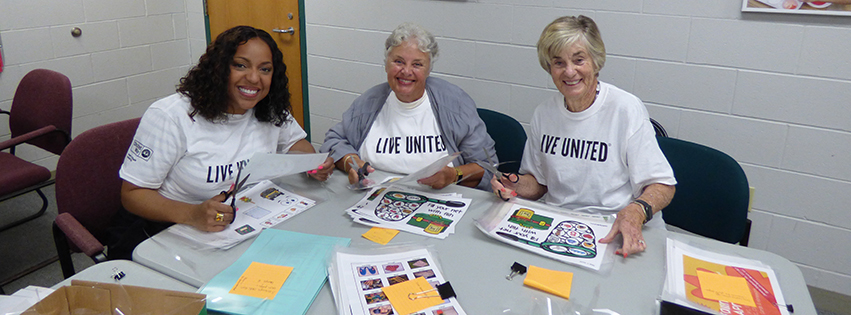 Volunteers crafting materials