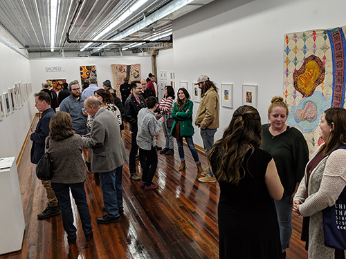 Visitors enjoying the gallery