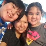 Bucky Smith, 10 years old, Lincoln Elementary School, East Peoria: Included in this picture is me and my Mom and my younger sister. My Mom was born in the Philippines and moved to U.S. 20 years ago. She keeps teaching me and my sister about her country and her family who she misses a lot. She said there is a big difference between growing up in the Philippines and growing up in America. Some day she plans to take us back to the Philippines to visit family and friends.