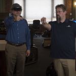 Pittman shows Wright how to manipulate visual (but virtual) cues in the Hololens world.