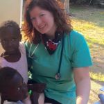 Sarah Kelley with children in Haiti