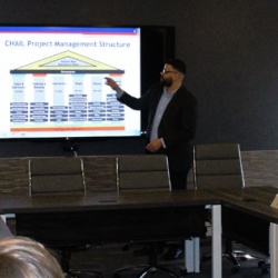 Lonnie Whisker, quality and performance improvement specialist and project portfolio manager at Children’s Home, presents the organization’s project management structure at a recent board meeting.