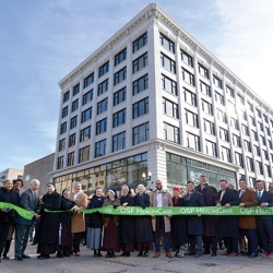 OSF HealthCare leaders cut the ribbon on the new Ministry Headquarters building in December 2021.