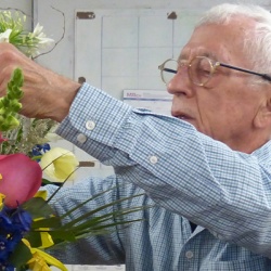 Dan Callahan arranging flowers